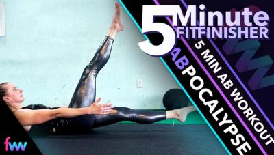 Kindal doing flutter kicks during an ab workout.