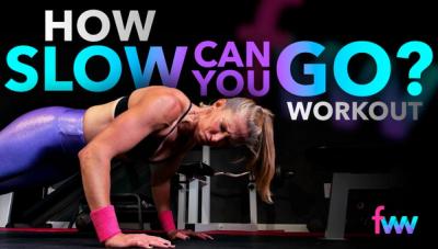 Kindal straining as she does a negative pushup rep trying to go as slow as she can possibly go.