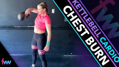 Kindal pulling up on the kettlebell during the floor snatch as she get's the kettlebell up and over her head.