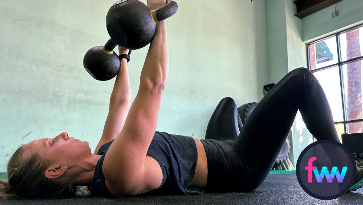 Kindal knocking out double kettlebell floor presses