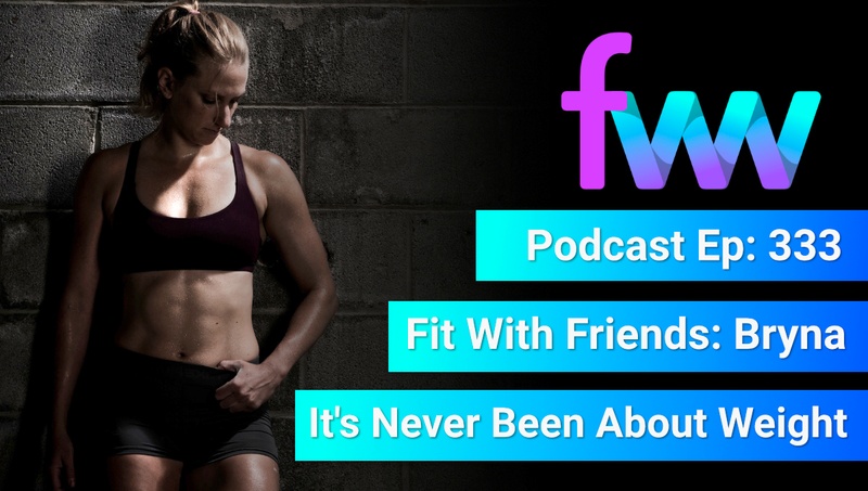 Kindal leaning against a wall looking fit and toned.