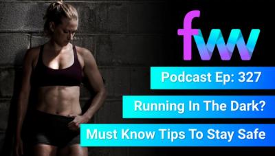 Kindal looking fit and strong leaning on a wall.