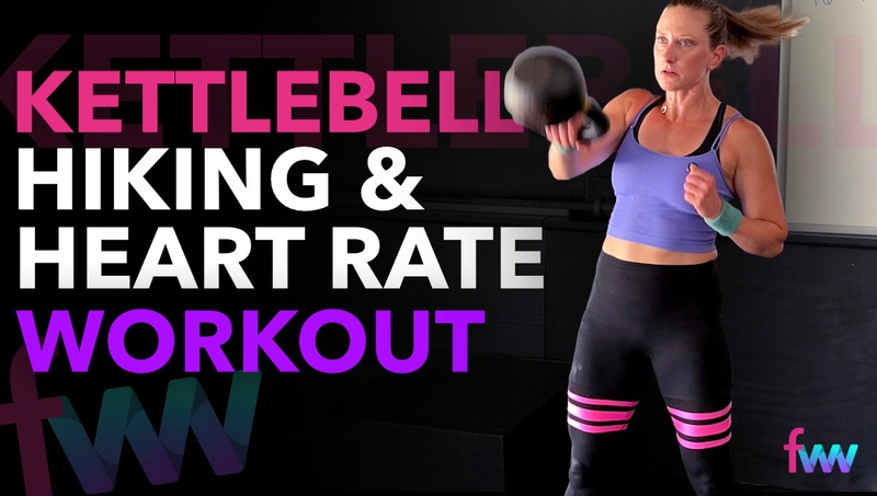 Kindal getting the kettlebell up and over her head during the heavy kettlebell snatches.