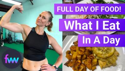 Kindal flexing with two of her meals beside her