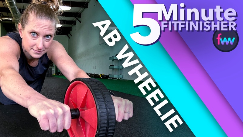 Kindal extending out during an ab wheel rep and working on